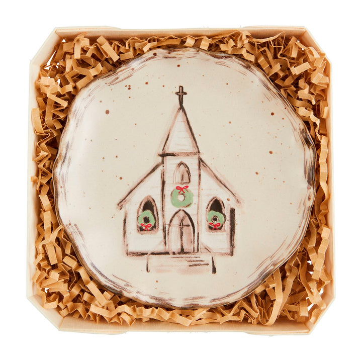 Nativity Trinket Dishes: a round, speckled stoneware dish featuring a hand-drawn church illustration with green wreaths.