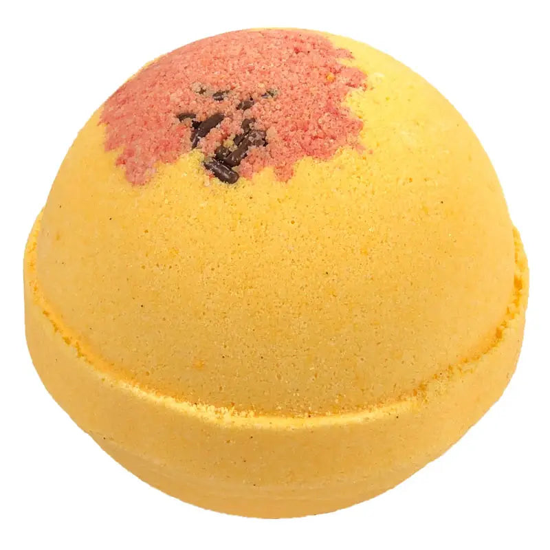 Yellow, spherical bath bombs with textured tops, pink patches, and dark specks. Essential oils. Available in multiple sizes.
