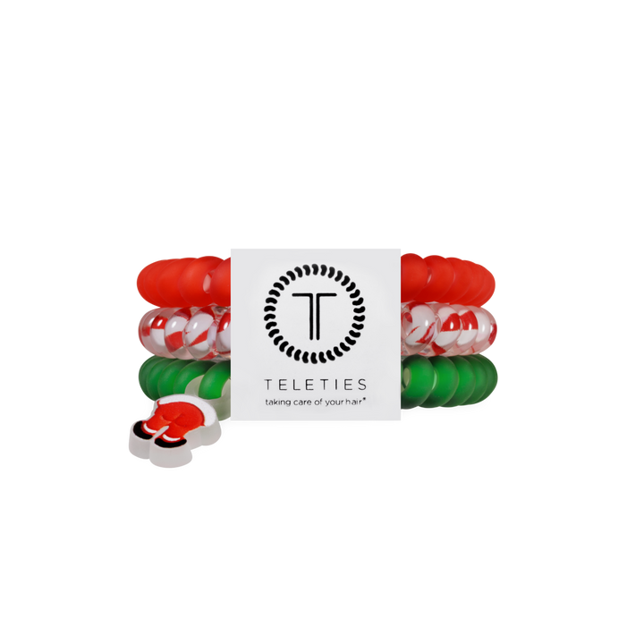 Three Claus I said So hair ties, size small, in red, candy cane swirl, and green, each with a Santa boot charm.