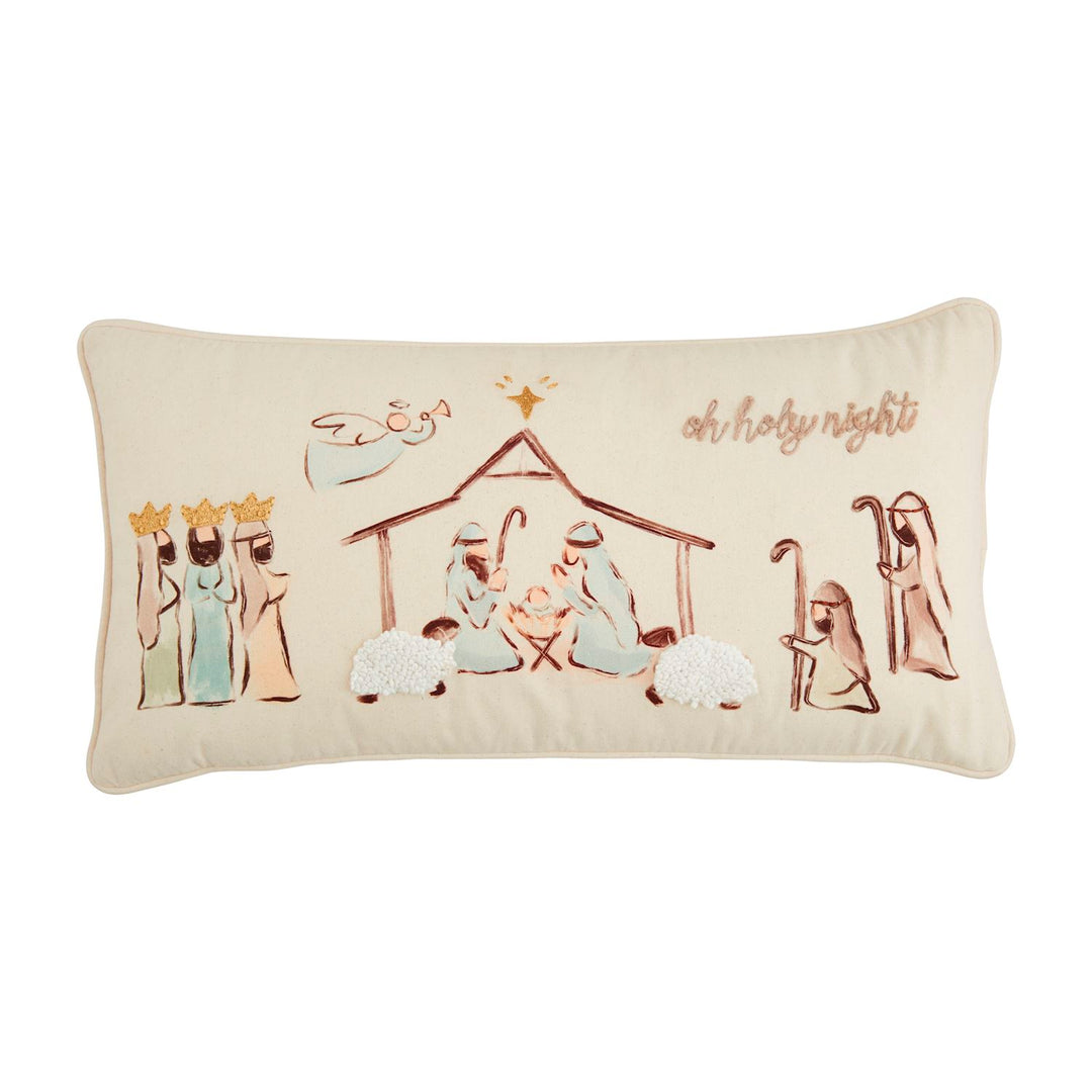 Embroidered canvas lumbar Nativity pillow featuring three kings, a manger, shepherds, and “oh holy night” script.