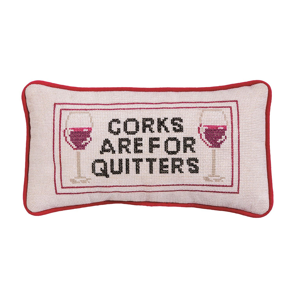 Mini needlepoint pillow, red trim, cross-stitched wine glasses, "CORKS ARE FOR QUITTERS" on beige. Sizes: mini.