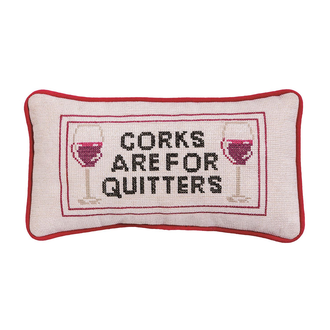 Mini needlepoint pillow, red trim, cross-stitched wine glasses, "CORKS ARE FOR QUITTERS" on beige. Sizes: mini.