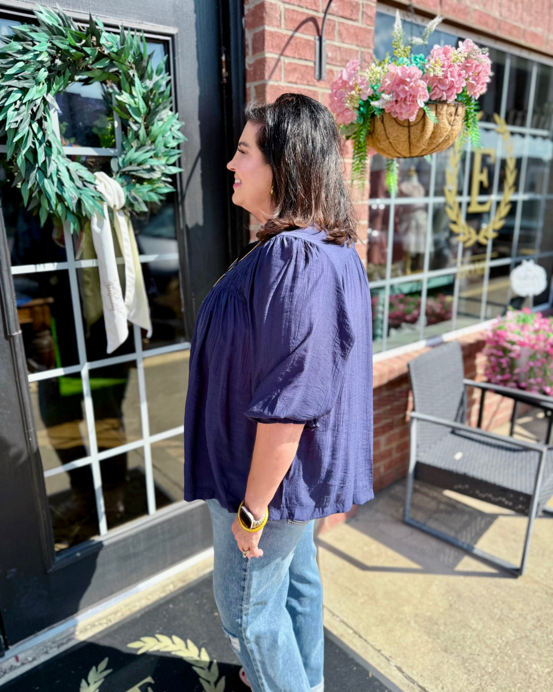Navy Smocked Yoke Button Front Blouse, available in sizes XS-XXL.