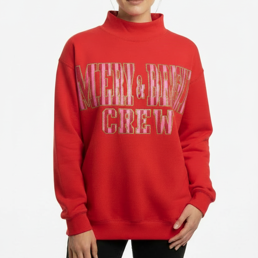 Merry And Bright Mock Neck Sweatshirt featuring “MERRY &amp; BRIGHT CREW” in large festive letters on the front; available in sizes S-XXL.
