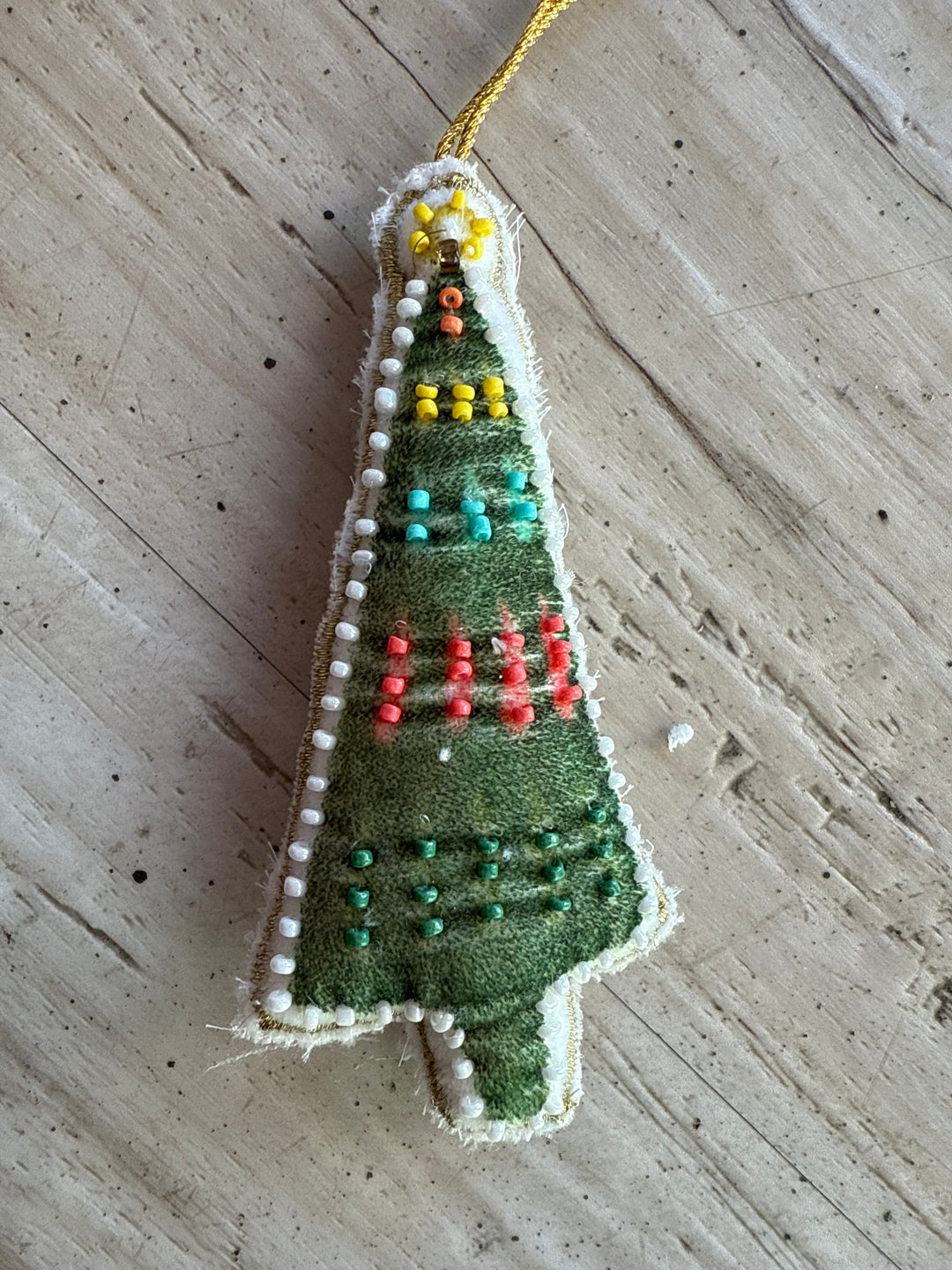 Cotton Velvet Snowman Ornament with embroidery and glass beads, featuring a green fabric design with colorful beads and white beaded edges.