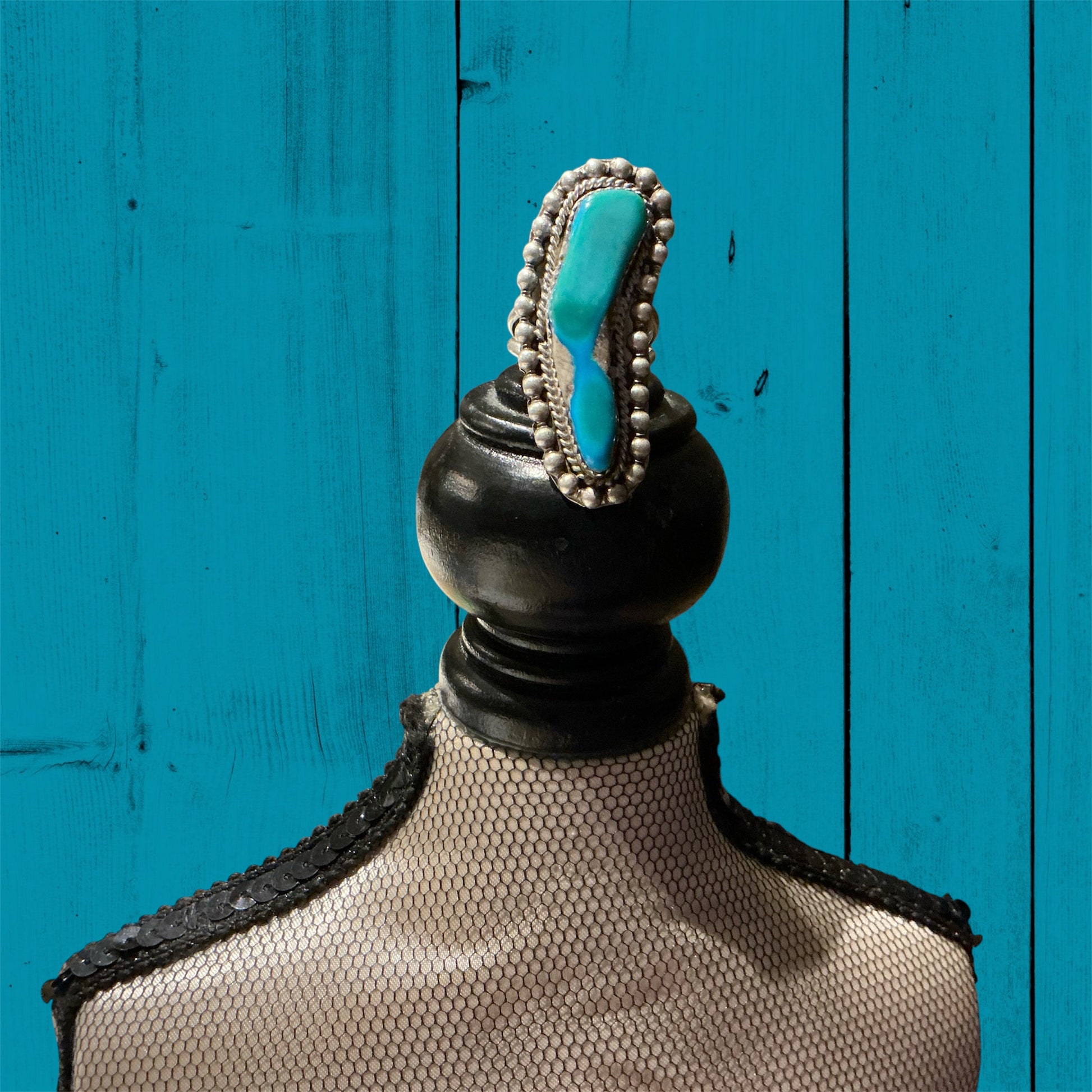 Vintage Cloud Sterling Silver Turquoise ring, available in sizes 6-9. Concise, elegant design with rich turquoise centerpiece.