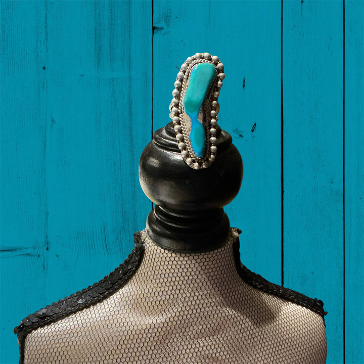 Vintage Cloud Sterling Silver Turquoise ring, available in sizes 6-9. Concise, elegant design with rich turquoise centerpiece.