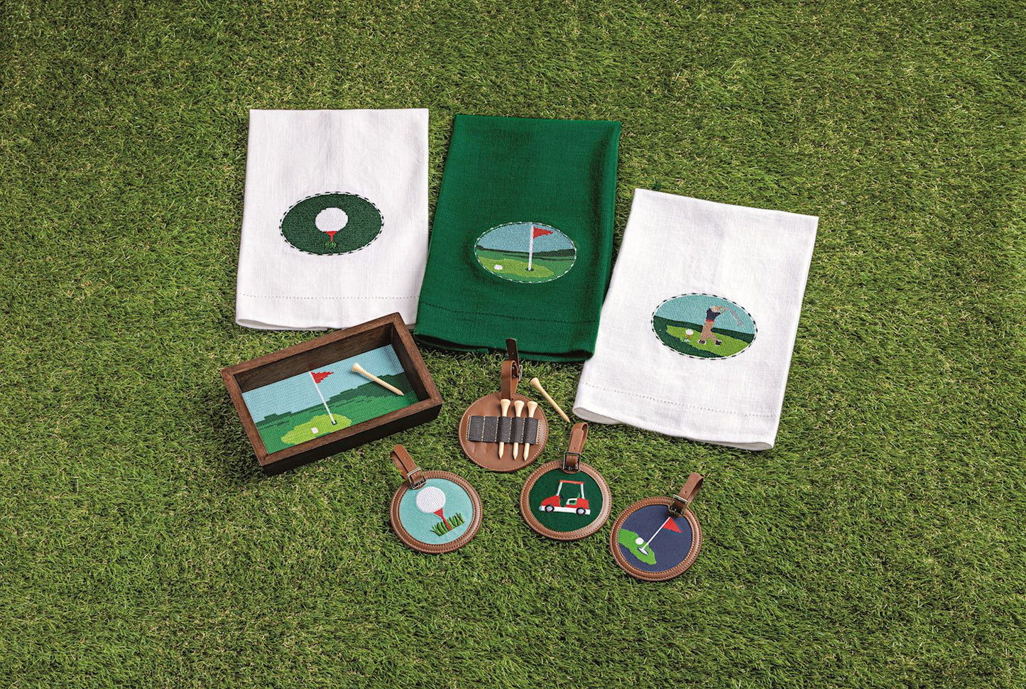 Embroidered golf towels (white or green), available in standard size.