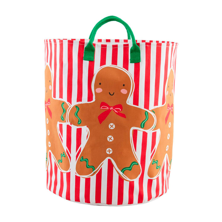 Gingerbread Oversized Tote, cylindrical canvas bag with red and white stripes, gingerbread man motifs, and two green handles.