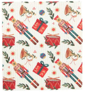 Christmas Dishcloths featuring a repeating pattern of nutcrackers, drums, gifts, and bells.