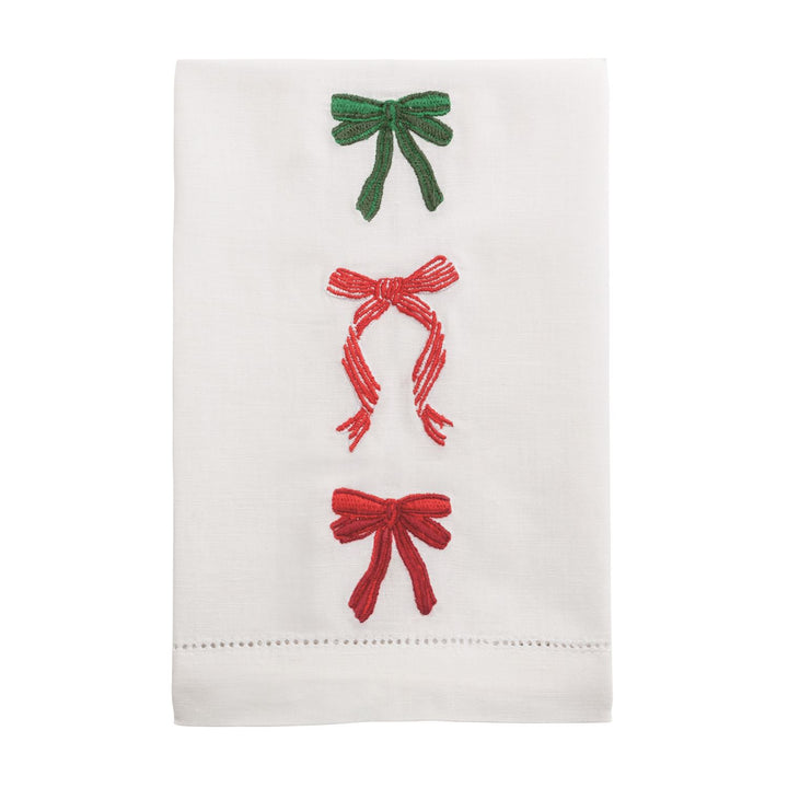 Bow Embroidered hand towel in white cotton with three vertical green and red bows.