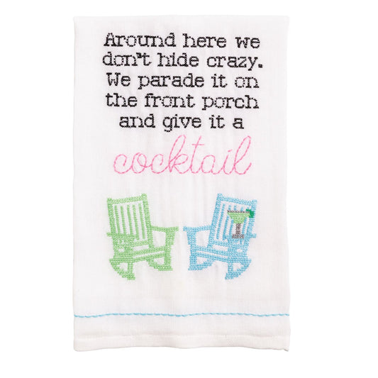 White flour sack towel with embroidered text and two rocking chairs, one holding a drink. Available in standard kitchen size.