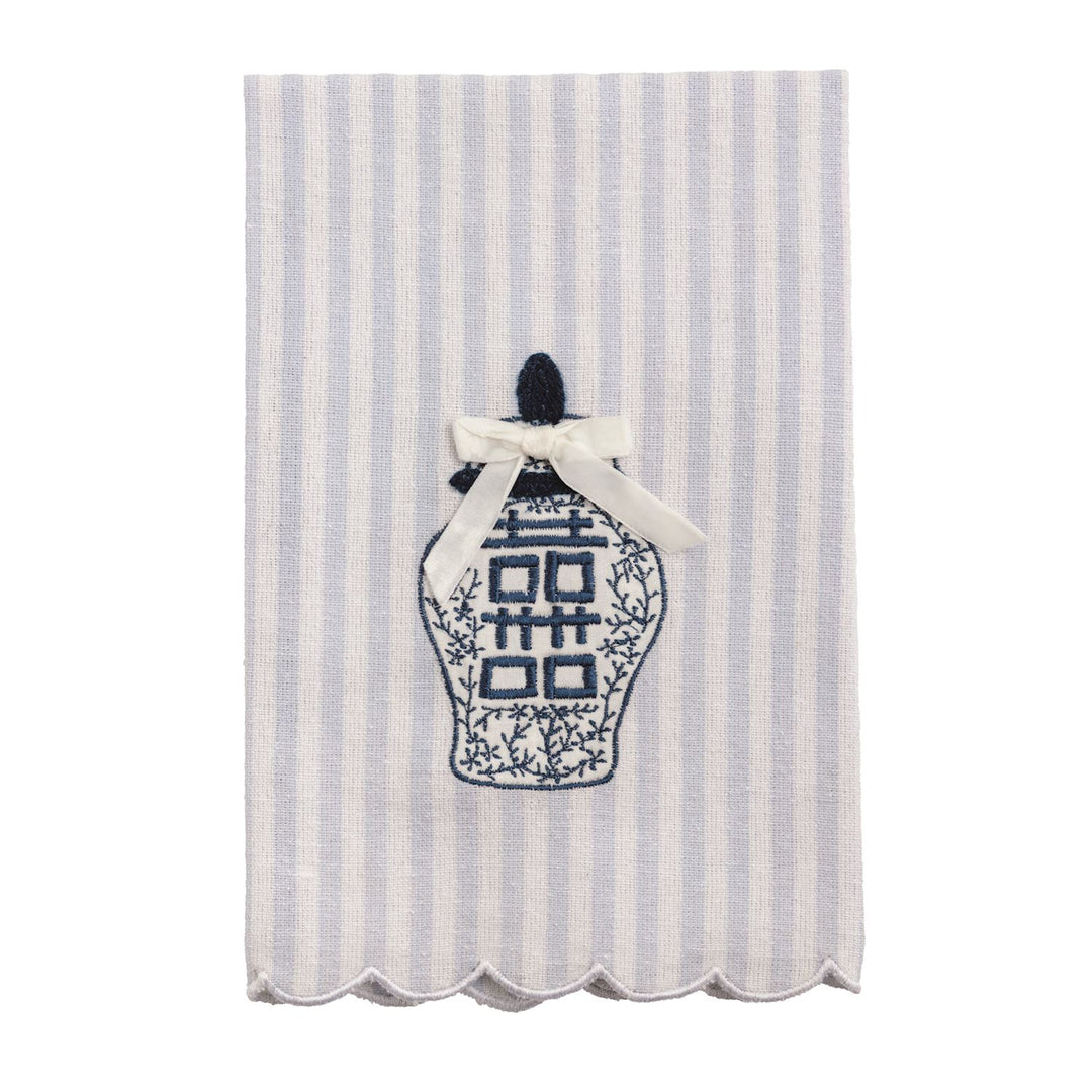 Tea towel with white and light blue stripes, scalloped edges, blue topiary embroidery, cream bow. Available in one size.