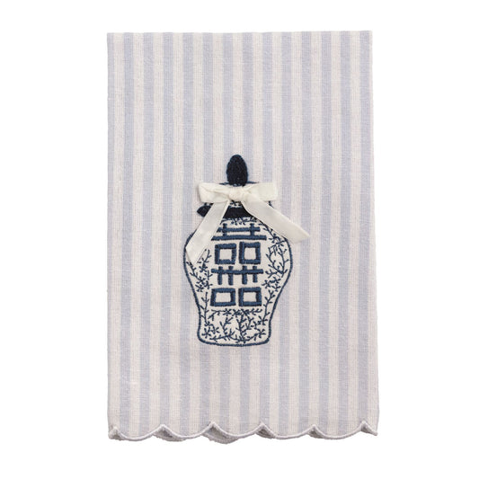 Tea towel with white and light blue stripes, scalloped edges, blue topiary embroidery, cream bow. Available in one size.
