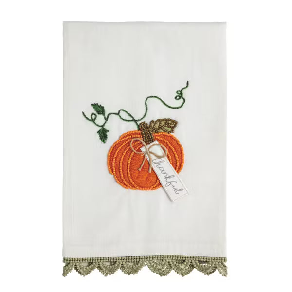 White kitchen towel with beaded orange pumpkin, green leaves, stem, “Thankful” tag, and green crocheted lace edge. Sizes available: [please specify sizes].