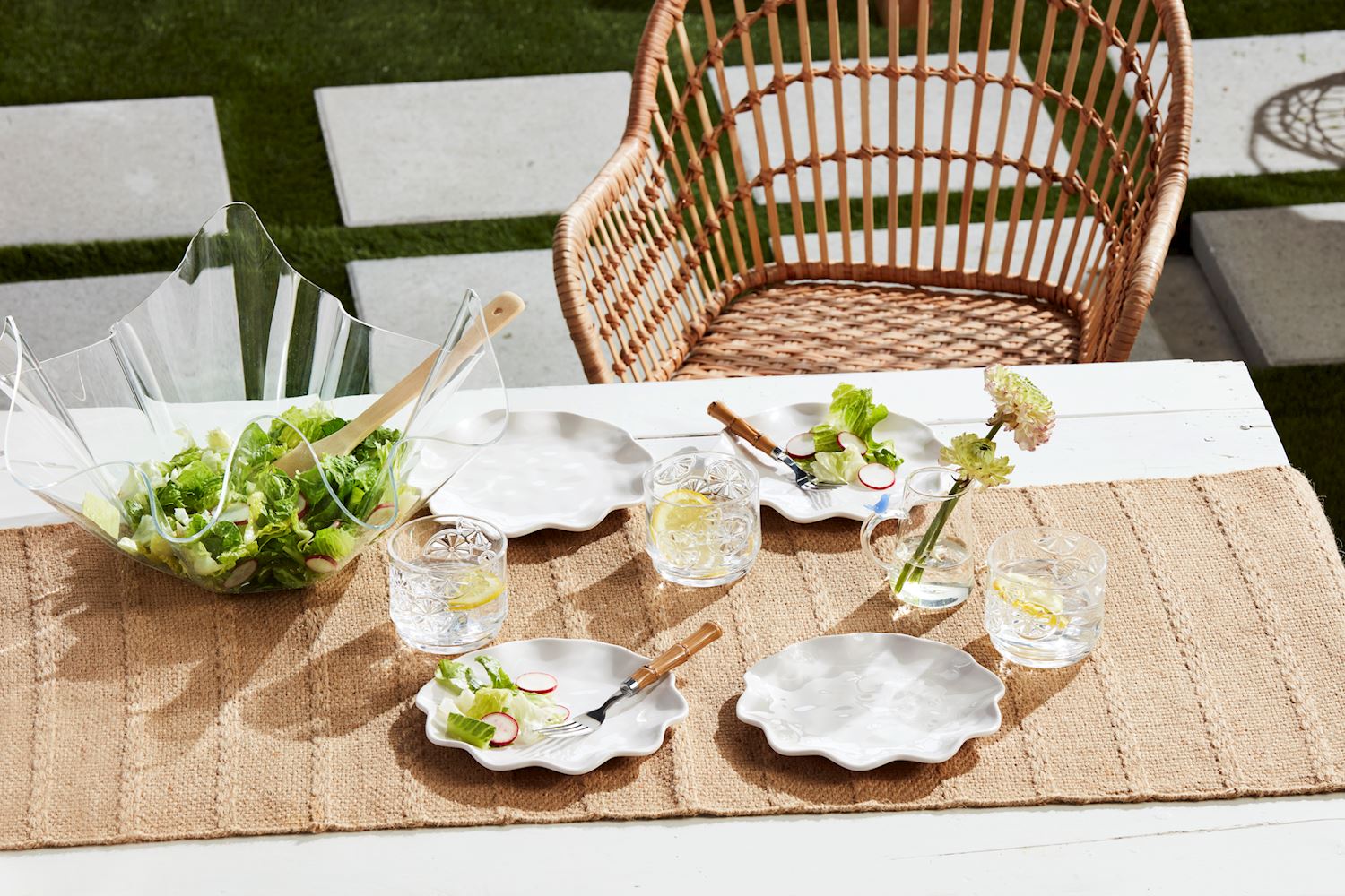Four Ruffle Melamine Plates (small, medium, large) set on a white table.