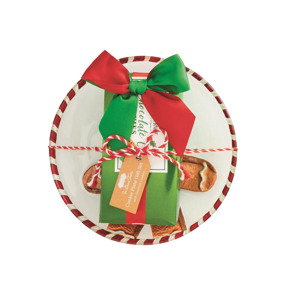 Holiday Gourmet Cookie Plate Set featuring a white plate with a red and white striped rim, topped with a green gift box tied with a red and green bow and a gift tag.