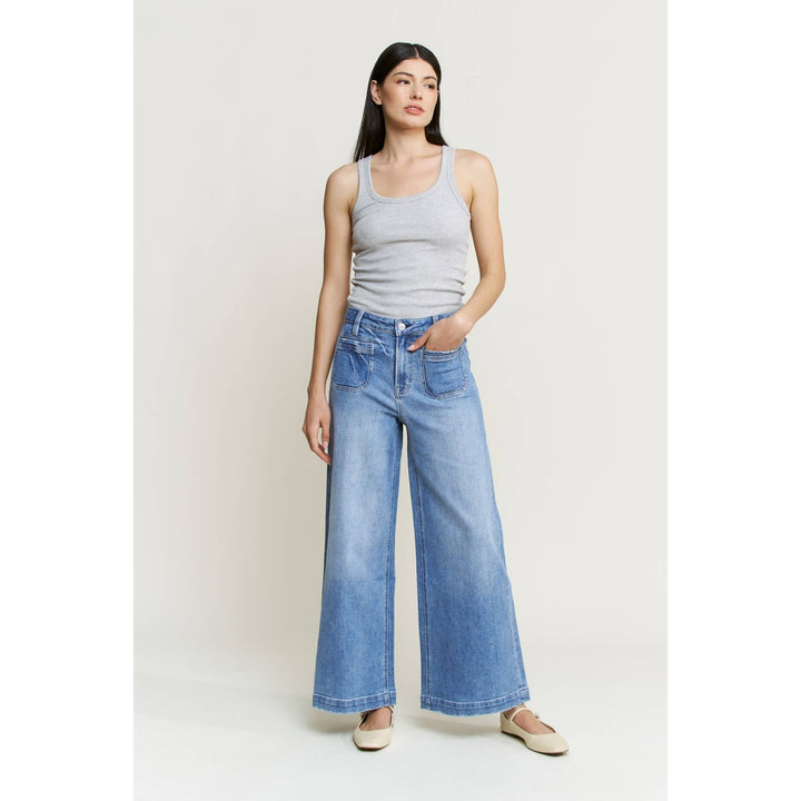 Super high ankle wide-leg blue cotton jeans with front patch pockets. Available in size 32.
