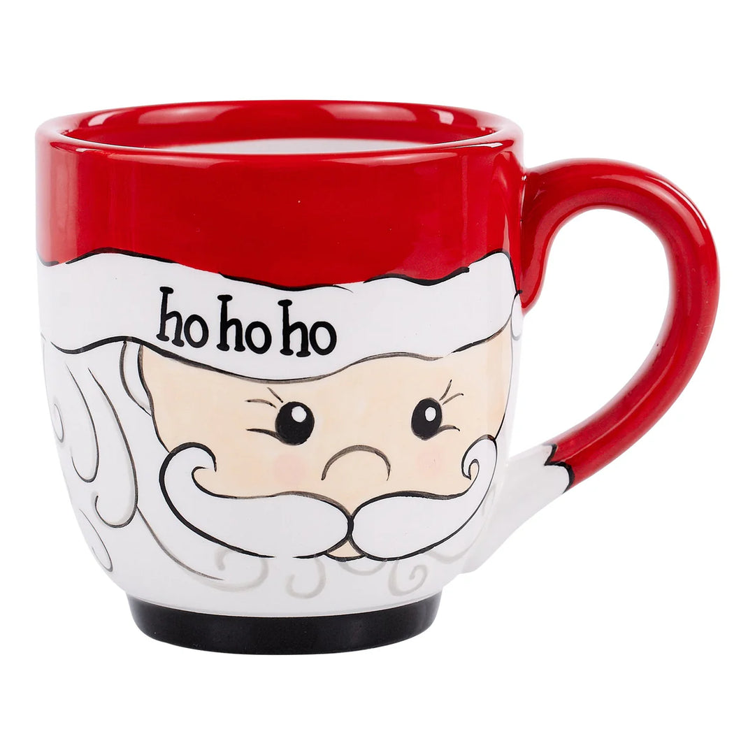 Santa Ho Ho Ho mug shaped like Santa Claus with a red hat rim and “ho ho ho” written across the brim.