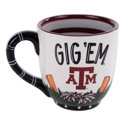 Let's Go Aggies Mug with black handle, "GIG 'EM" above logo, orange/green/maroon accents. Available in 11oz and 15oz.