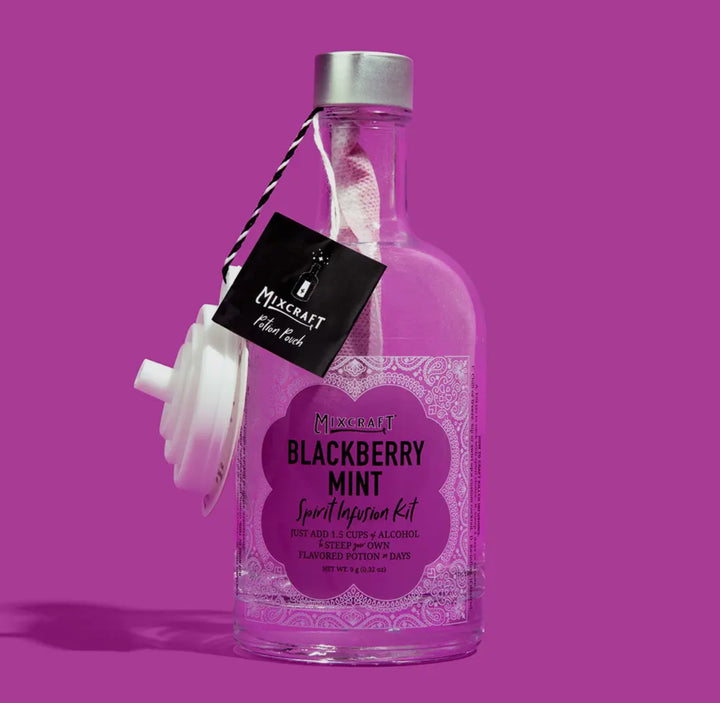 Clear bottle labeled “Spirit InFusion Kit” with purple design, white cap, black tag, and separate white pour spout. Sizes: 375ml, 750ml.
