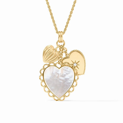 Pendant with three heart charms: mother-of-pearl, ribbed, and sunburst gem. Available sizes: S, M, L. Vintage-inspired.