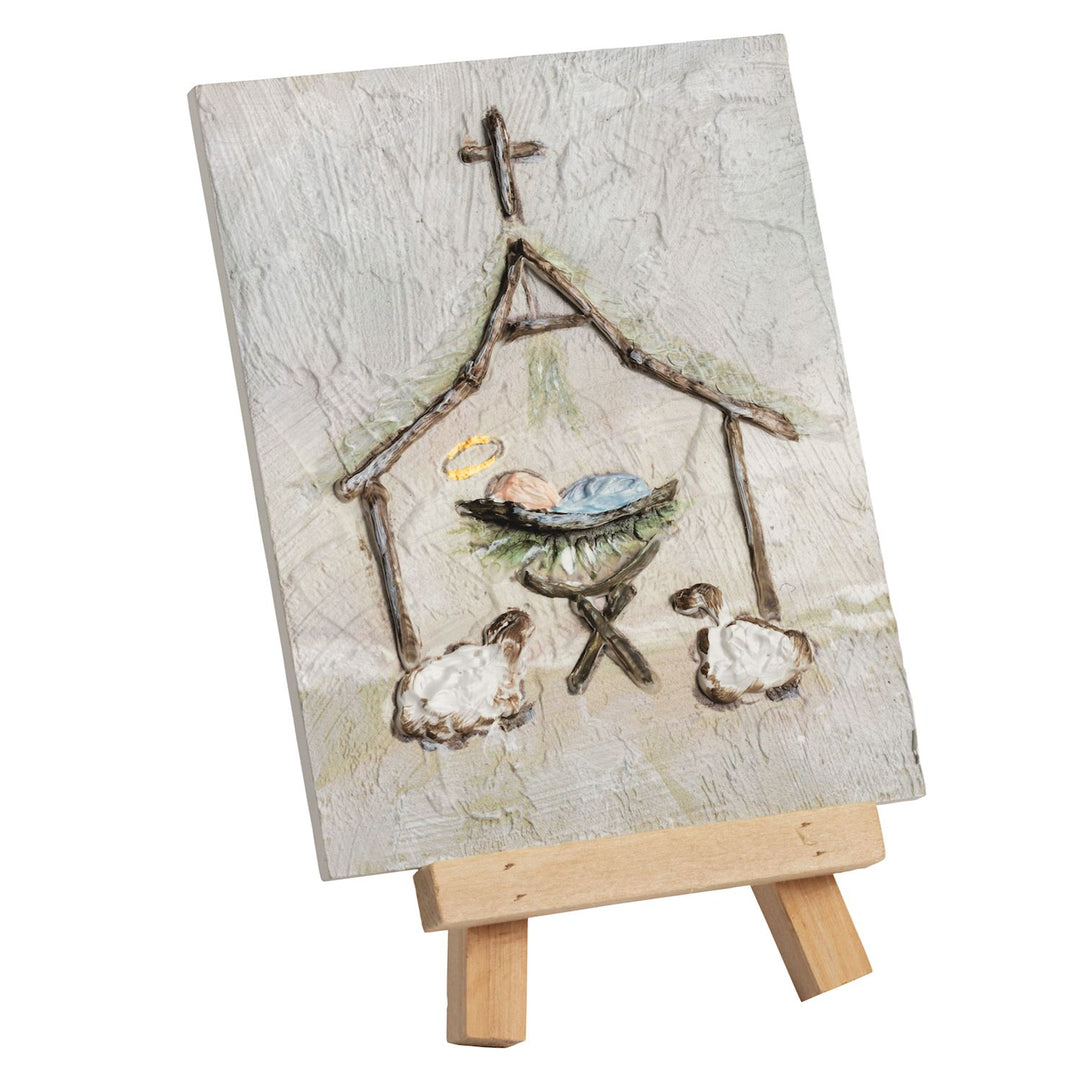 Holiday Farmhouse Art Plaque featuring a nativity scene with baby Jesus, a star, and two sheep.
