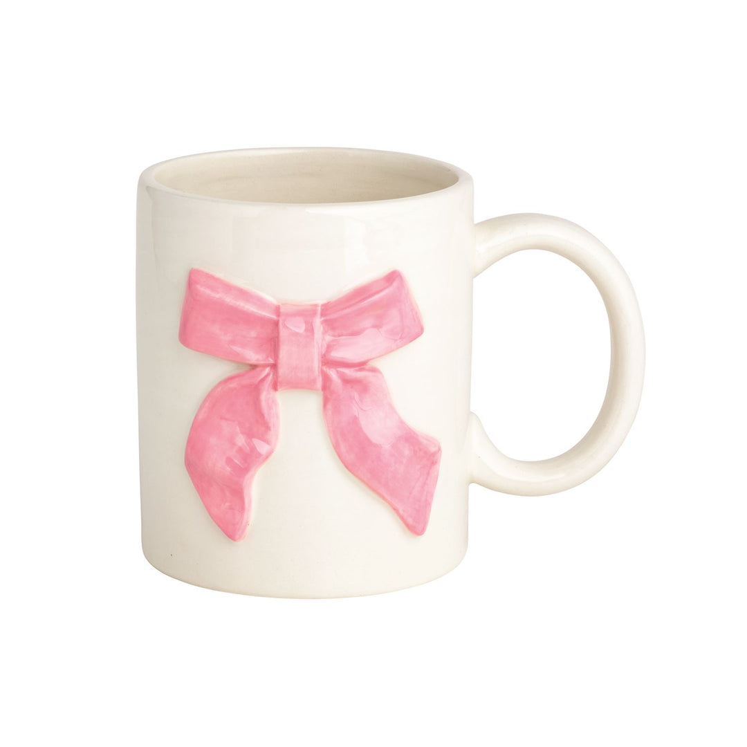 White ceramic mug with raised 3D pink bow on front. Available in 12oz and 16oz sizes.