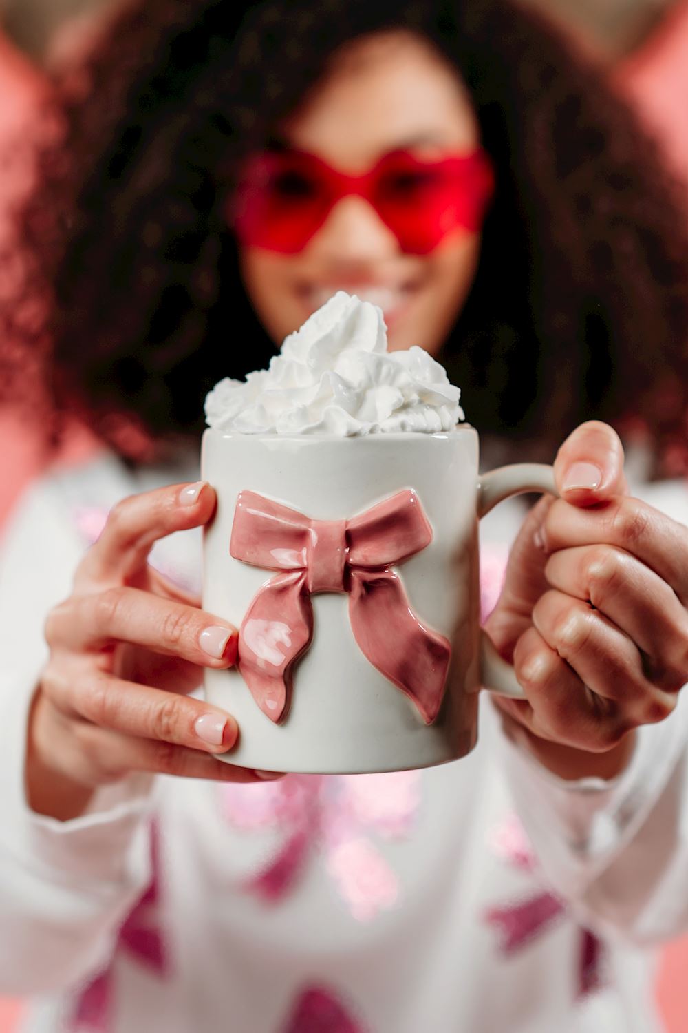 Valentine’s Day Mug with pink bow and whipped cream on top. Available in 12oz and 16oz sizes.