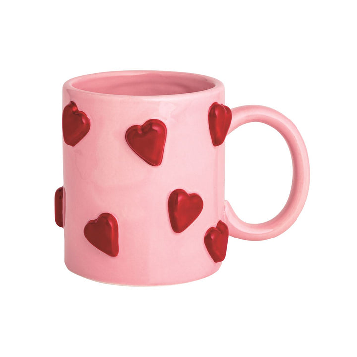 Pink ceramic mug with raised red hearts. Available in 12oz and 16oz sizes. Ideal for Valentine&