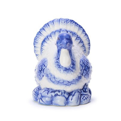 Blue and white hand-painted ceramic turkey candleholders with detailed feathers, available in multiple sizes.