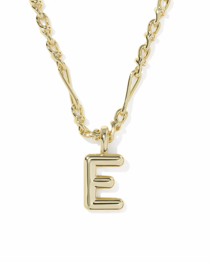 Bubble Letter Necklace by Kendra Scott with a bold, uppercase “E” pendant on a textured gold chain; available in various lengths.