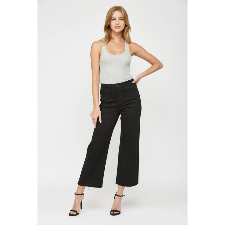 Wide-leg cropped jeans in Black Mica Denim with a raw hem, size 24.