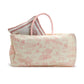 The Animal Toile Hamper/Storage Tote features a cream-colored exterior, pink handles, and a light red pastoral scene pattern. Made of cotton canvas. Ideal for nursery storage.

Sizes available: One size.