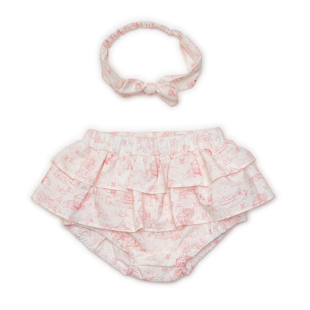 White diaper cover with pink toile animal print and matching bow headband. Available in sizes 0-3M, 3-6M, and 6-12M.