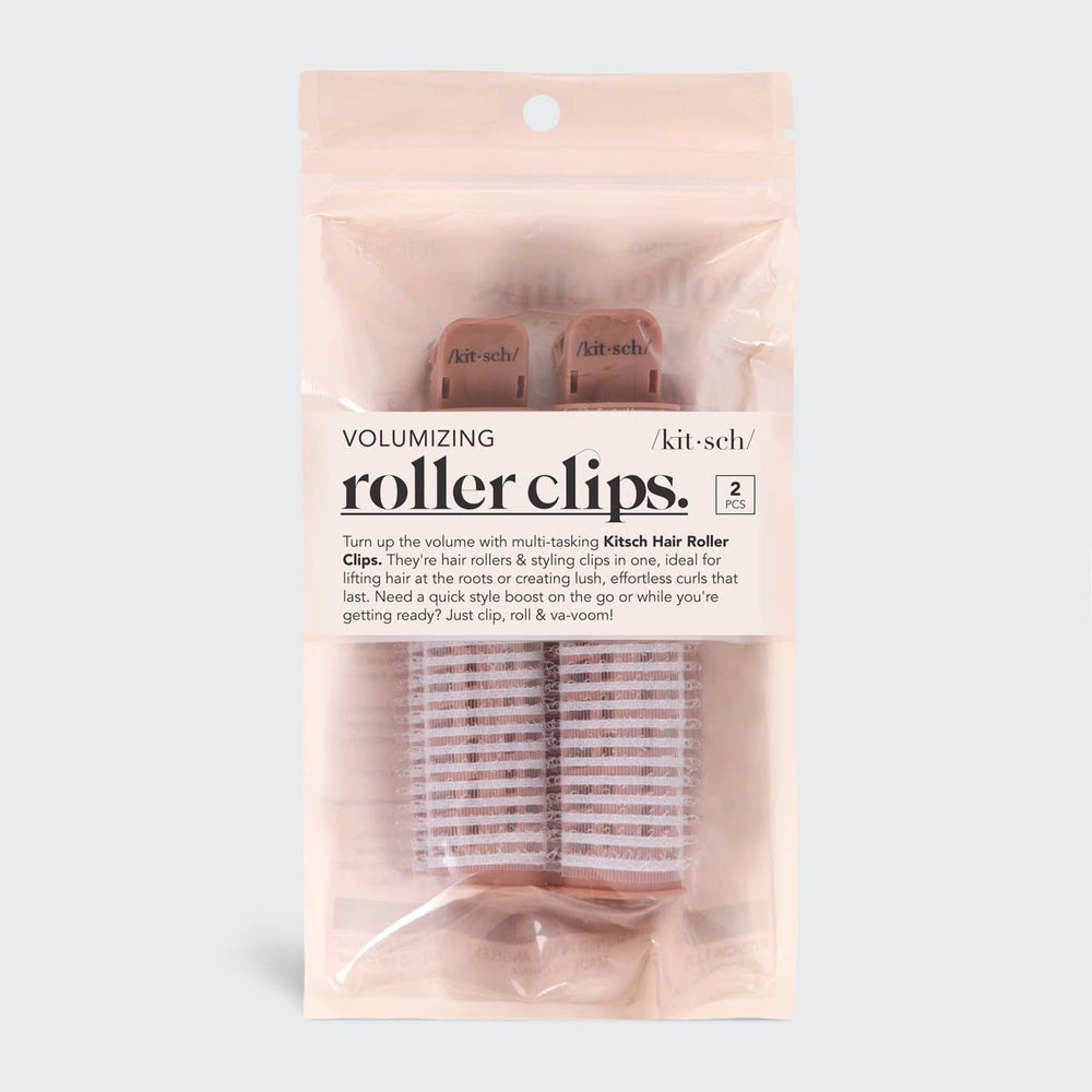 Clear package with two pink Kitsch Volumizing Roller Clips; black label. Available in standard size. For volume and curls.
