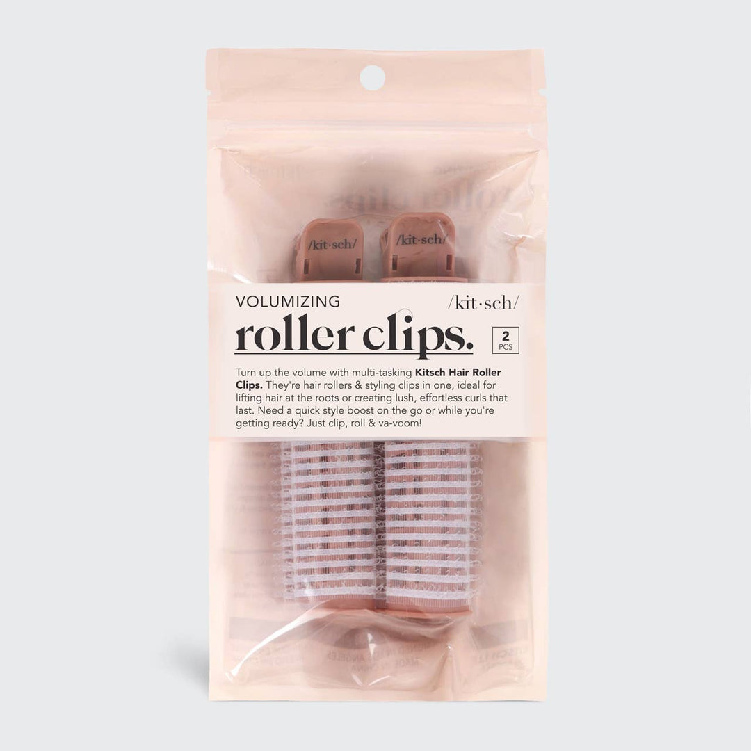 Clear package with two pink Kitsch Volumizing Roller Clips; black label. Available in standard size. For volume and curls.