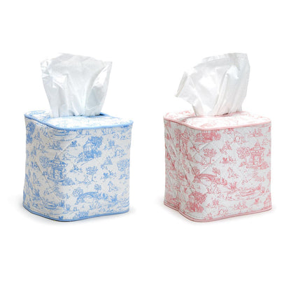 Two cube-shaped tissue box covers: one in blue toile pattern, the other in red animal toile quilted design, both depicting countryside scenes. Sizes: Standard cube size.