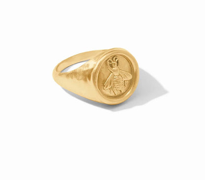 Gold signet ring with engraved bee cameo on round face. Available in sizes 5-9.