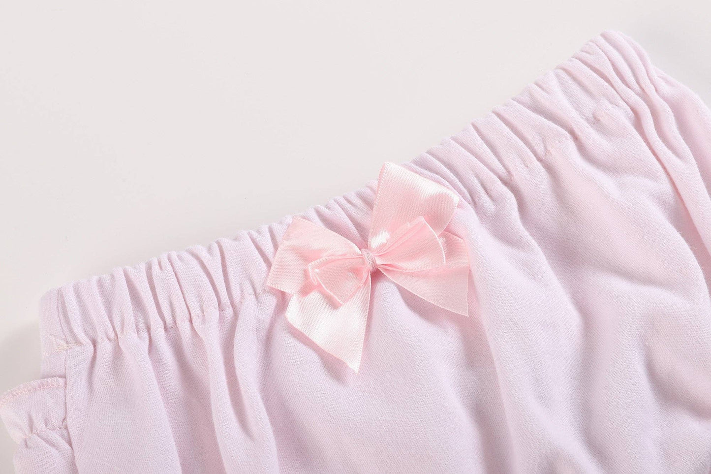 White and Pink Baby Bloomers Knit 2pc Set (3-6M): soft cotton, pink ruffles, elastic waist, satin bow.