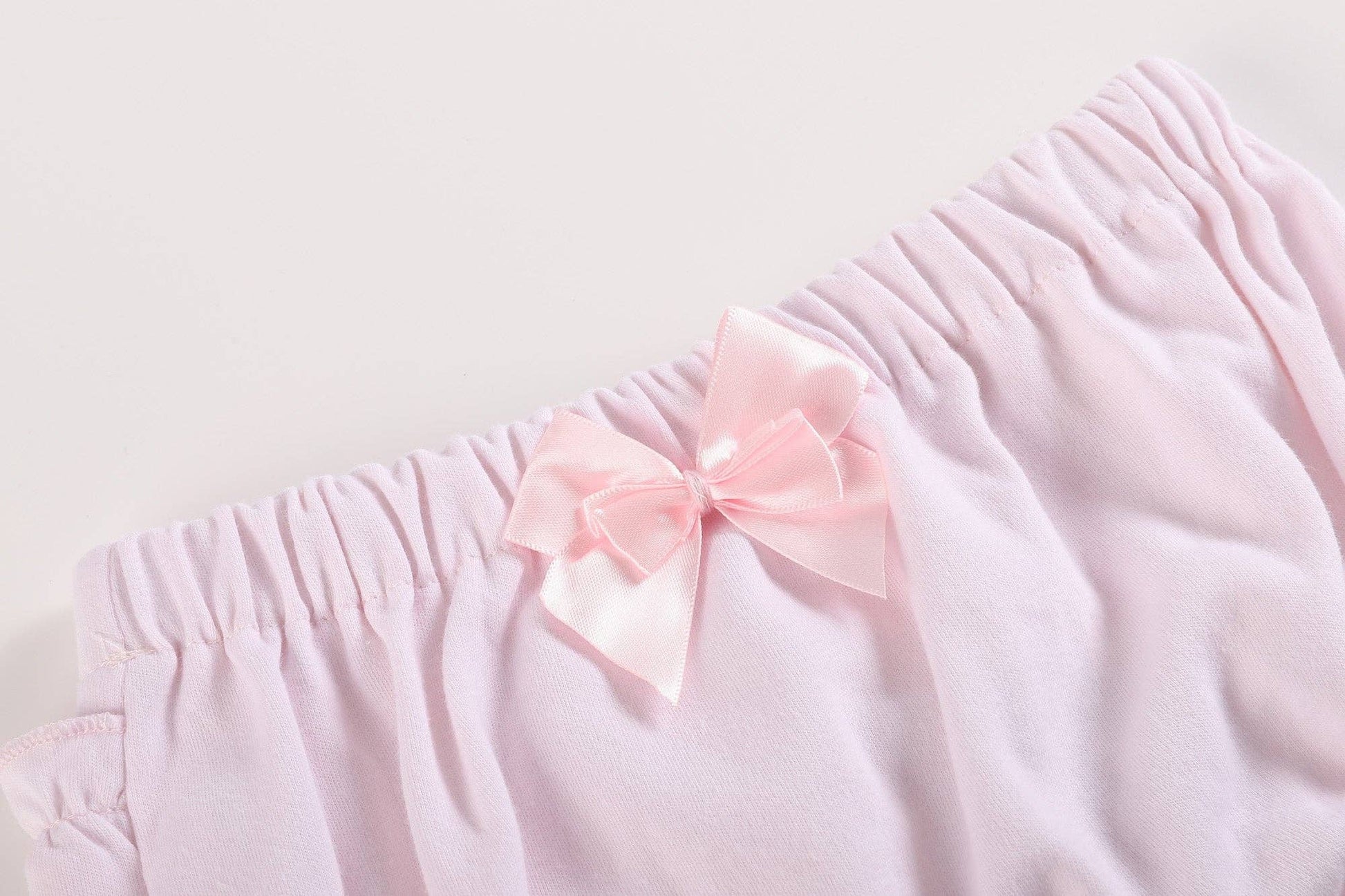 White and Pink Baby Bloomers Knit 2pc Set (3-6M): soft cotton, pink ruffles, elastic waist, satin bow.