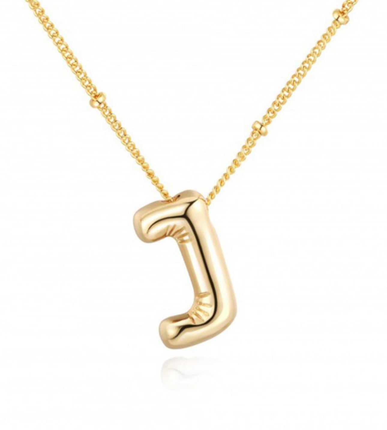 This product is a Personalized Bubble Balloon Initial Necklace. It features the letter "j" as the pendant, giving it a unique characteristic. The pendant hangs from a delicate bead chain that adds elegance to its overall look. The necklace is displayed against a plain white background that highlights its details and craftsmanship. This product only comes in one standard size suitable for all adults.