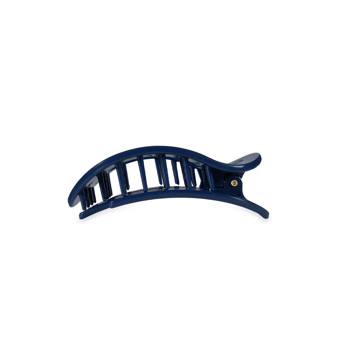 Dark blue plastic hair clip with curved, vented design and spring hinge. Available sizes: small, medium, large.