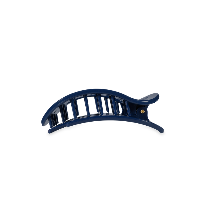 Dark blue plastic hair clip with curved, vented design and spring hinge. Available sizes: small, medium, large.