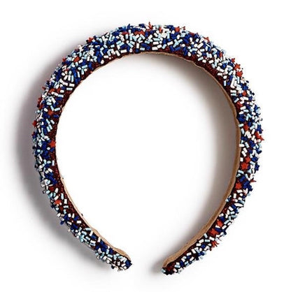 Padded headband with red, white, and blue beads. Patriotic design. Available in 4 colors and multiple sizes.