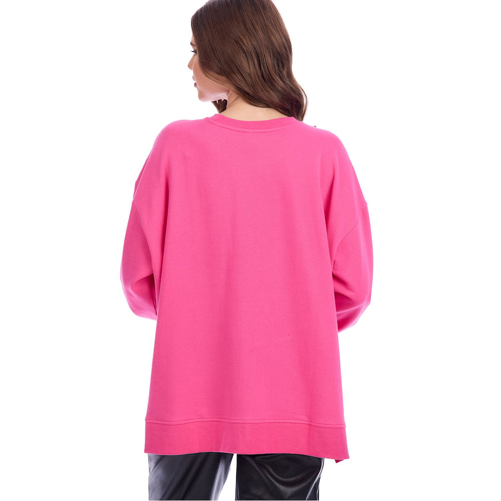 Hey Boo Tinsel Sweatshirt in bright pink; available in sizes XS-XL.