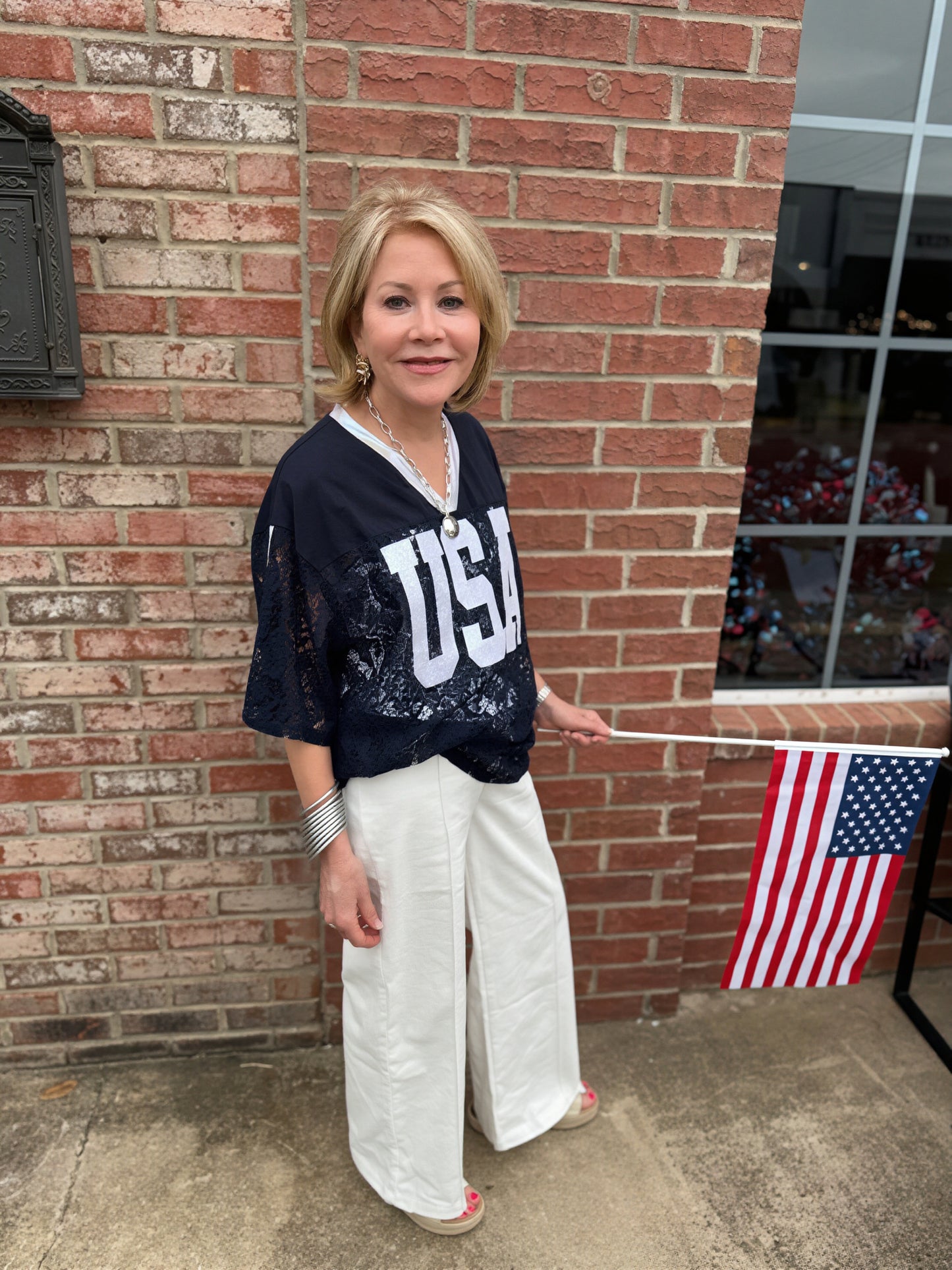 Navy Lace "USA" Jersey, sporty and feminine. Available in sizes XS-XL.