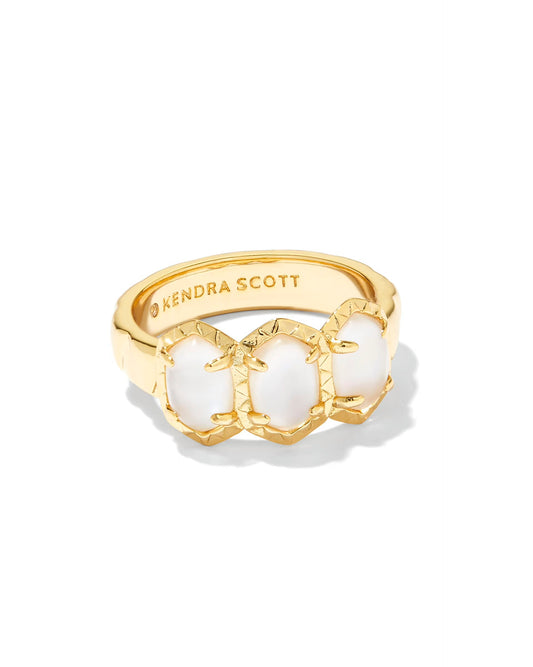Gold ring with three oval ivory stones, claw-set, “KENDRA SCOTT” engraved inside. Available in sizes 5-9.