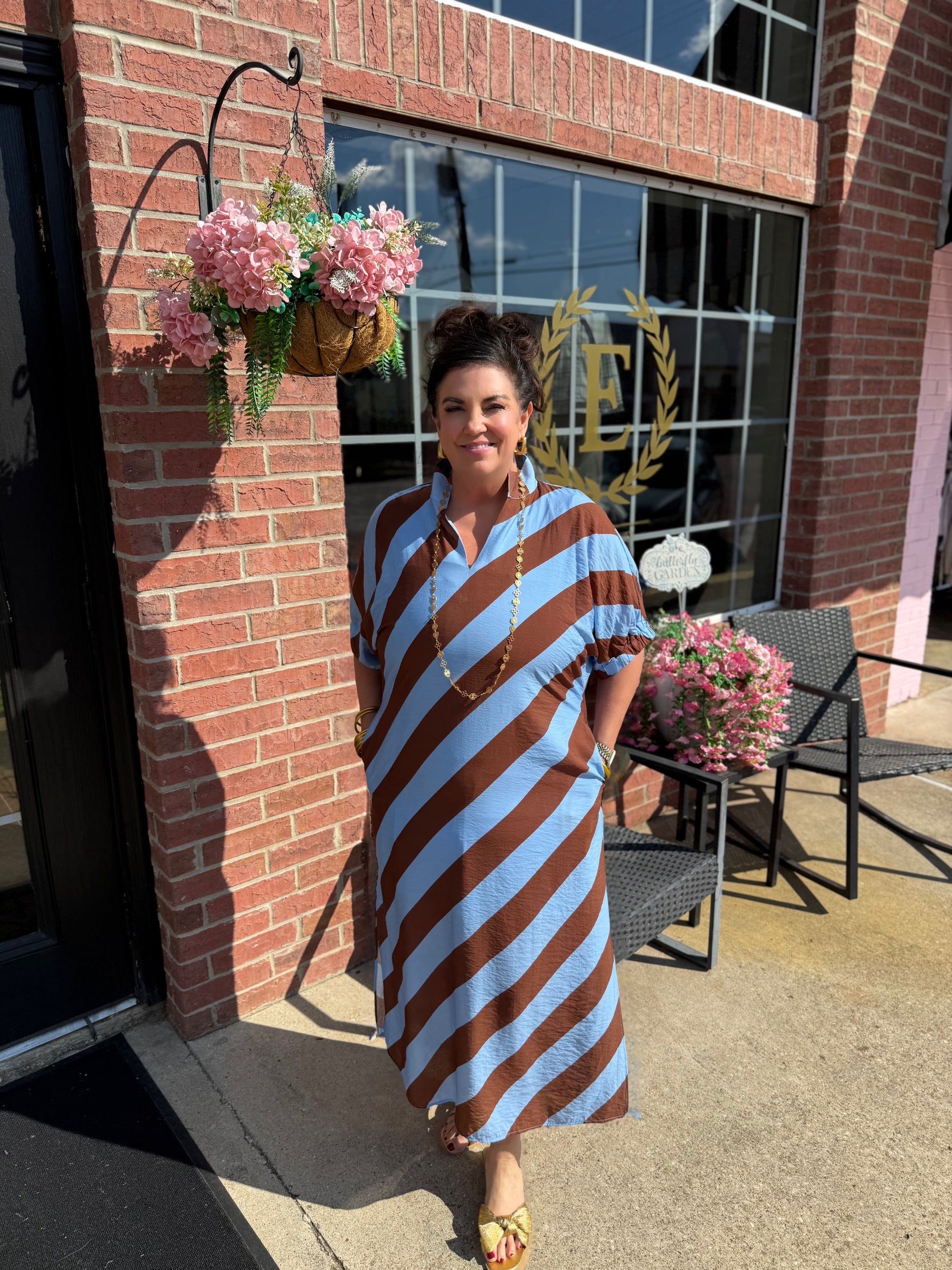 Riverwood Stripe Midi Dress featuring a classic striped pattern and midi length; available in sizes XS–XL.