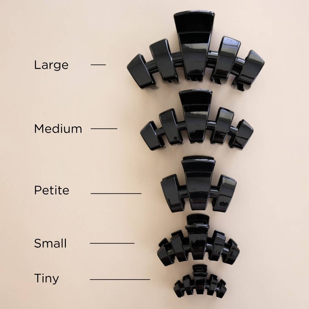 Classic Claw Clip in Jet Black shown in five sizes: Large, Medium, Petite, Small, and Tiny.
